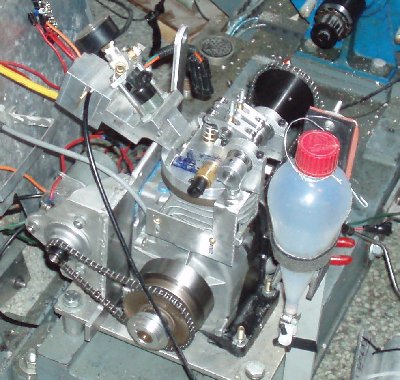 An example of a very efficient, yet unreliable engine. Electronic Fuel Injection, Pressurized Oil System, Sleeved Cylinder, Single Overhead Cams, and Starter Motor