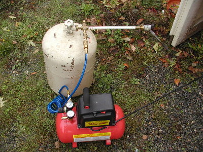 First I took my torch post for soldering and added a ball valve and quick connect.  This enabled me to fill an obsolete propane tank with air.