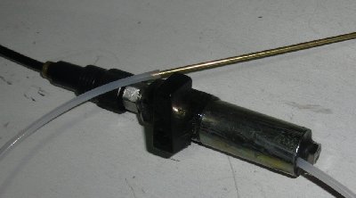 Detail of the chamber (cut from a CO2 capsule) and 1/8&amp;quot; ball valve which will eventually be servo operated.  Note also the bolt closing off the port that allows reloading.