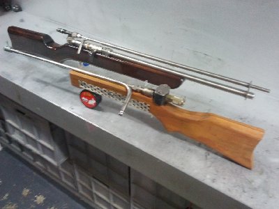 The old single-shot 6.5mm QEV gun and the new 5 shot .177 QEV air rifle