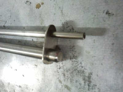 the end of the air tank and barrel, the bracket was made from some stainless  steel plating.