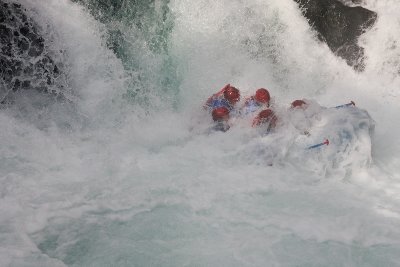 5 guys in a raft and 2 taking a refreshing swim.  Water is 40 degrees.