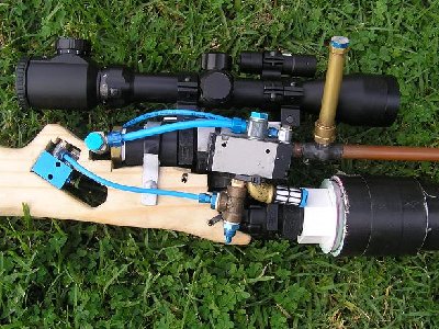 Main valve mech - Air enters from the bottom and permanenetly pressurises the chamber.  When the trigger valve is fired, it forces the solenoid valve to switch the old 'outlet' to vent via the air silencer (black and white thing)