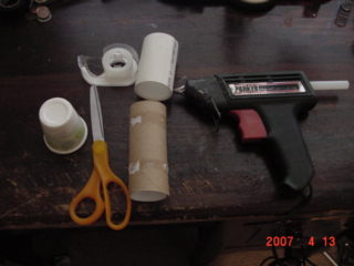 This is the stuff your going to need:scissors,Toliet paper roll,hot glue gun,2 paper bath cups,tape,and a piece of 1 1/2&amp;quot; PVC pipe 3-4&amp;quot; long.