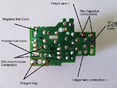 Output wire 1 goes to the positve side of the spark coil. It is soldered to the positive side of the capacitor.<br />Trigger wire 1 is also connected to the positive side of the capacitor.<br />The bridged gap was just were the original on off touch switch was, it will be different depending on the circuit you use. Since I controll on and off from the battery case I just connect the two pads.<br />The original 220ohm resistor was removed and the 390 ohm soldered in.<br />If you cannot figure out were to put this resistor in the circuit you are using, then get a lower value, say 100 ohm and put it in series with one of the battery connections.<br />The original battery holder things are removed and the leads from the holder soldered into their places. Take note of which one is positive and which is negative before you take them off.