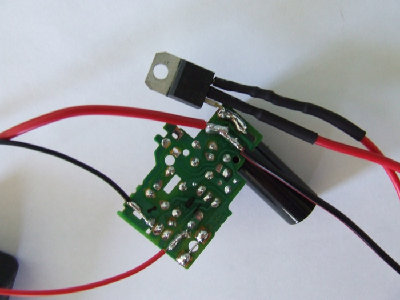 This is the finished circuit board. Trigger wires 1 and 2 are connected to the push button switch. I enclosed mine in a film canistor to make it easy to use.